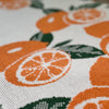 Kniitted blanket of Oranges with green leaves. Knitted in Australia on the Mornington Peninsula. Organic Cotton