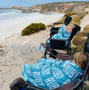 At The Knit Studio we knit our personalised baby blankets in 100% Organic Cotton. These Cot sized blankets are Aqua and Pale Blue. There are 25 colours and 7 fonts plus over 50 graphic symbols to choose from. Sustainably, each blanket is individually knitted to order. This custom blanket is personalized with the name of your choice. Australian Made and owned, we provide free shipping worldwide. Design your own named blanket. Perfect for baby’s birthday or camping holidays and toddler bed.