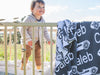 At The Knit Studio we knit our personalised baby blankets in 100% Organic Cotton. This Cot sized blanket is Navy Blue and Pale Blue, with a racing car symbol. There are 25 colours and 7 fonts plus over 50 graphic symbols to choose from. Sustainably, each blanket is individually knitted to order. This custom blanket is personalized with the name of your choice. Australian Made and owned, we provide free shipping worldwide. Design your own named blanket and we’ll provide a quality guarantee.