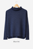 merino wool knitted jumper in blue ink colour with rolled neckline