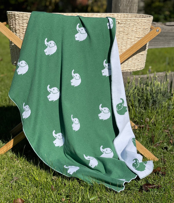 The Knit Studio. Fine knit Elephant blanket. Choose from a selection of colours. This soft pure organic cotton cot sized blanket is perfect for pram and bassinet to. Knitted in our studio on the Mornington Peninsula in Australia. Quality guaranteed. Forest and White.