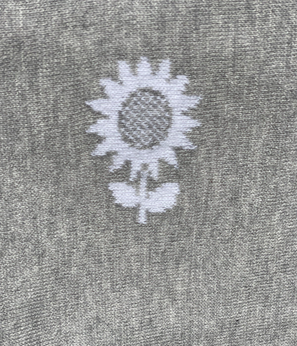 The cutest flower you ever did see. Our Fine Knit sunflower design will bring a smile to baby and toddler alike. Knitted in our studio on The Mornington Peninsula, Victoria, Australia, this blanky will become a security favourite. Pure and soft knitted from Organic Cotton, with a choice of on trand fashion colours. This is Pale Grey and White