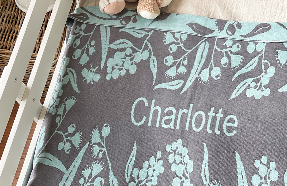 At The Knit Studio we knit our personalised baby blankets in the finest quality Organic Cotton. This Cot sized blanket is Designed by us from our Designer Collection. Soft and luxurious, the perfect keepsake. Choose from our preselected colour combos. Sustainably, each blanket is individually knitted to order. This custom blanket is personalized with the name of your choice. Australian Made and owned, we provide free shipping worldwide. Great for couch cuddles too. Choice of size. Quality Guaranteed.