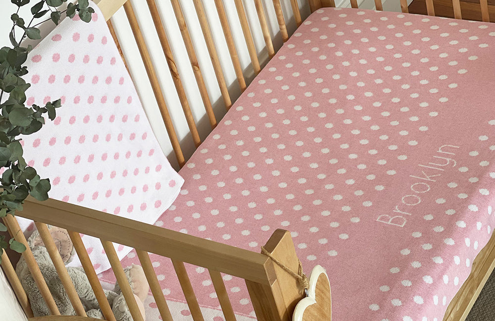 The Knit Studio personalised baby blankets are knitted in the finest quality Organic Cotton. This Spotty or Polka Dot Cot sized blanket is Designed by us from our Designer Collection. Soft and luxurious, the perfect keepsake. Choose from our preselected colour combos. Sustainably, each blanket is individually knitted to order. This custom blanket is personalized with the name of your choice. Australian Made and owned, we provide free shipping worldwide. Great for couch cuddles too. Choice of size. 