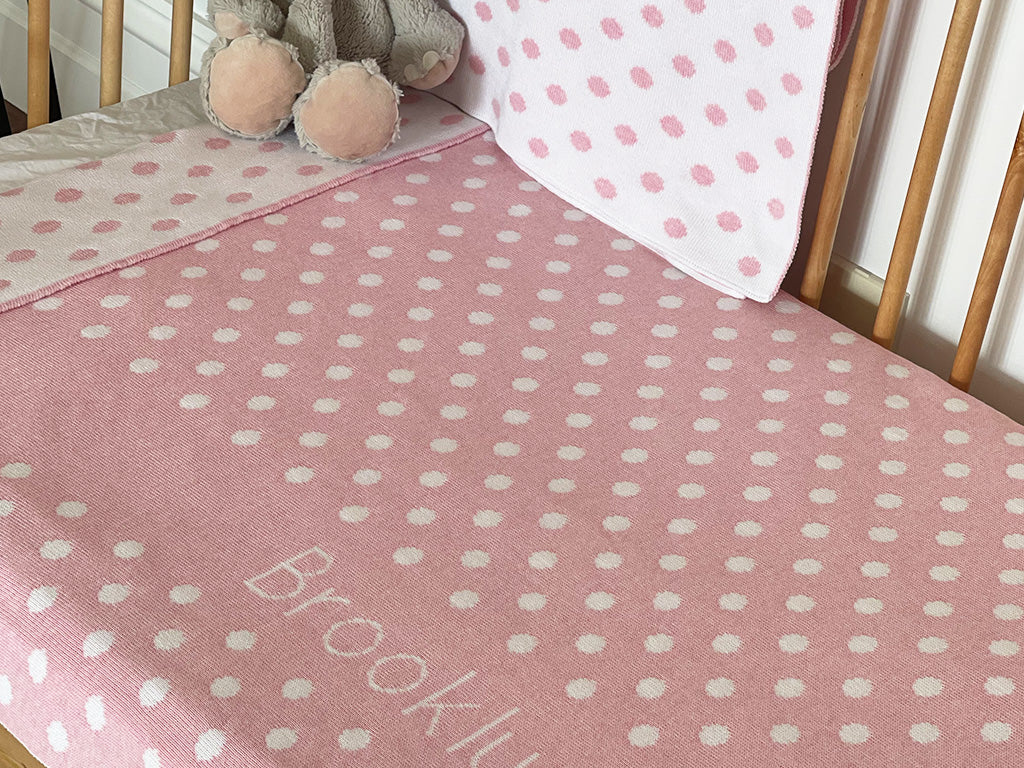 The Knit Studio personalised baby blankets are knitted in the finest quality Organic Cotton. This Spotty or Polka Dot Cot sized blanket is Designed by us from our Designer Collection. Soft and luxurious, the perfect keepsake. Choose from our preselected colour combos. Sustainably, each blanket is individually knitted to order. This custom blanket is personalized with the name of your choice. Australian Made and owned, we provide free shipping worldwide. Great for couch cuddles too. Choice of size. 