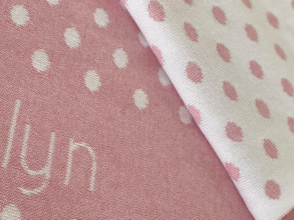 The Knit Studio personalised baby blankets are knitted in the finest quality Organic Cotton. This Spotty or Polka Dot Cot sized blanket is Designed by us from our Designer Collection. Soft and luxurious, the perfect keepsake. Choose from our preselected colour combos. Sustainably, each blanket is individually knitted to order. This custom blanket is personalized with the name of your choice. Australian Made and owned, we provide free shipping worldwide. Great for couch cuddles too. Choice of size. 