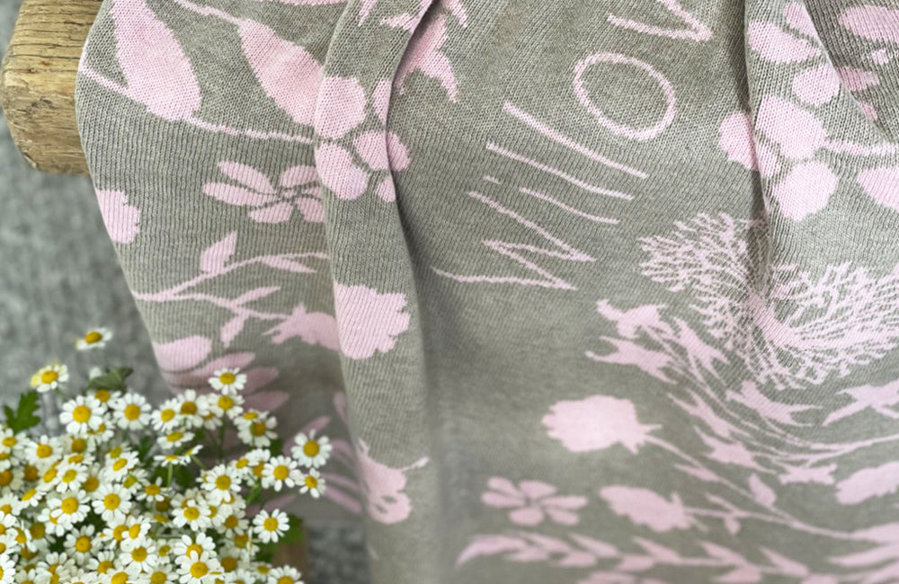 The Knit Studio personalised baby blankets are knitted in the finest quality Organic Cotton. This Spring Cot sized blanket in Mid Grey and Pale Pink is Designed by us from our Designer Collection. Soft and luxurious, the perfect keepsake. Choose from our preselected colour combos. Sustainably, each blanket is individually knitted to order. This custom blanket is personalized with the name of your choice. Australian Made and owned, we provide free shipping worldwide. Choice of size. 