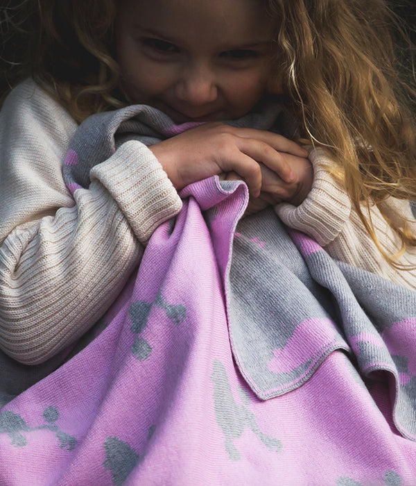 At The Knit Studio we knit our personalised baby blankets in Extra Fine Merino Wool. This Cot sized blanket is soft and luxurious, the perfect keepsake. There are 6 on trend colours and 7 fonts plus over 50 graphic symbols to choose from. Sustainably, each blanket is individually knitted to order. This custom blanket is personalized with the name of your choice. Australian Made and owned, we provide free shipping worldwide. Great for couch cuddles too.